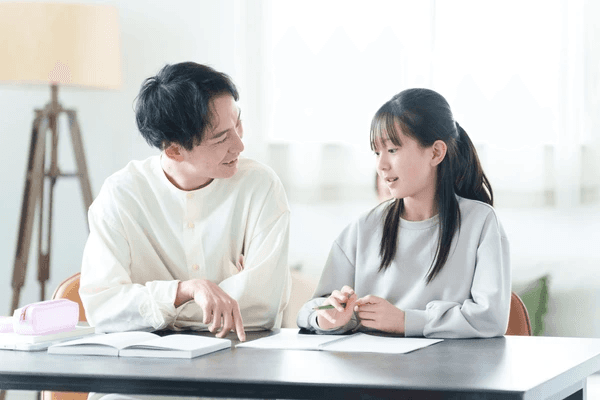 Tutor guiding a student through Chinese coursework